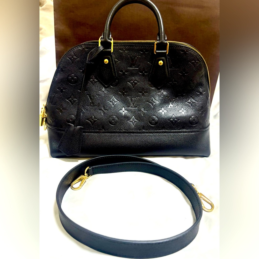 Louis Vuitton Black Leather Bag with Gold Accents